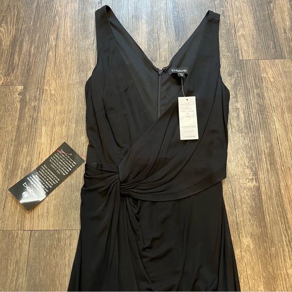 NWT BeBe Vibrant Asymmetrical Draped Dd black Dress. V neckline Size XXS - Picture 3 of 16
